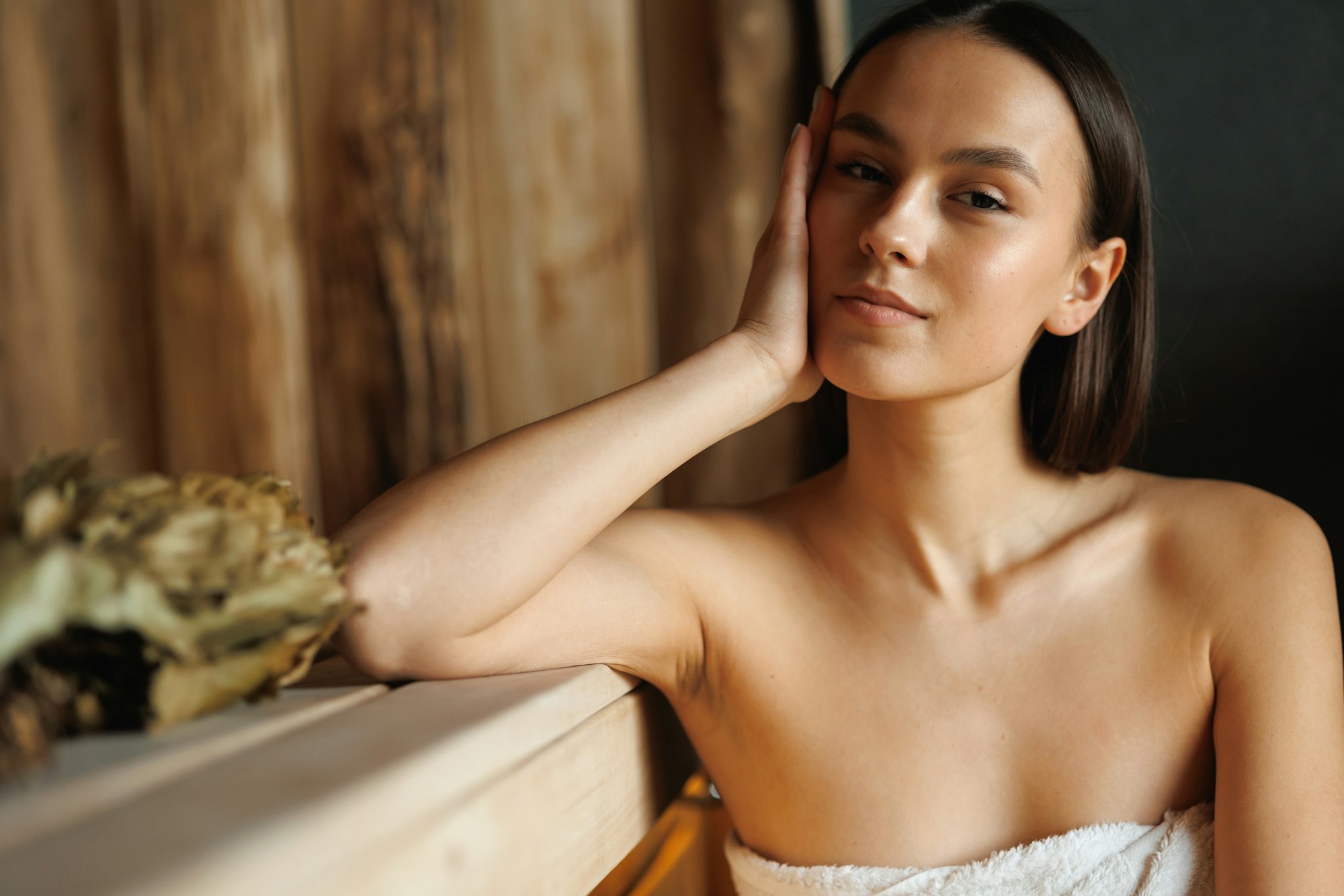 Beautiful woman on spa treatments in sauna